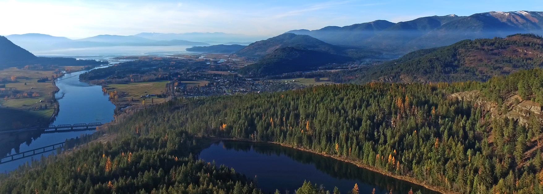 Antelope Lake overlooking the town of Clark Fork with the Clark Fork River to the left and Lake Pend Oreille in the background